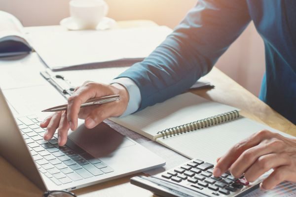 An image showing tax planning for a small business owner