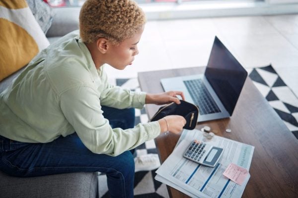 woman-wallet-and-finance-with-budget-and-money-ma-2023-11-27-05-08-49-utc